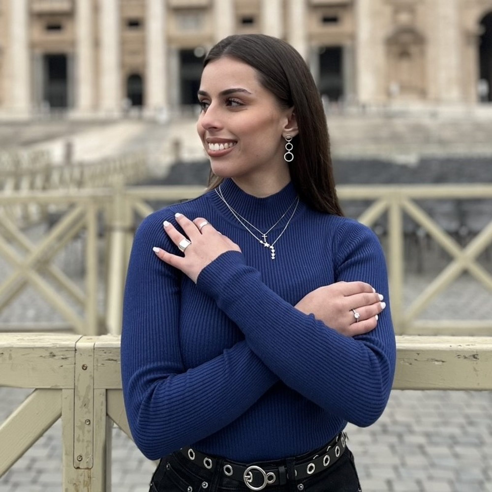 Silver dangle earrings with zircon stones
