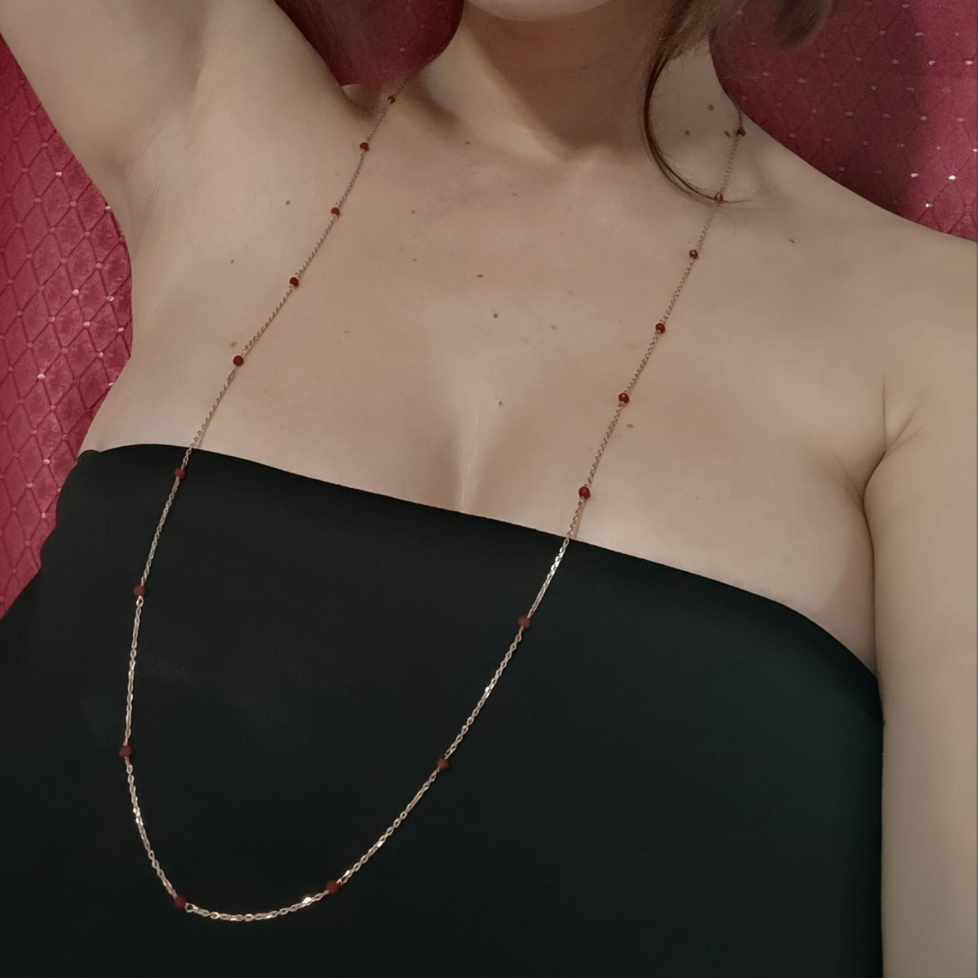 Rose gold necklace with burgundy stones
