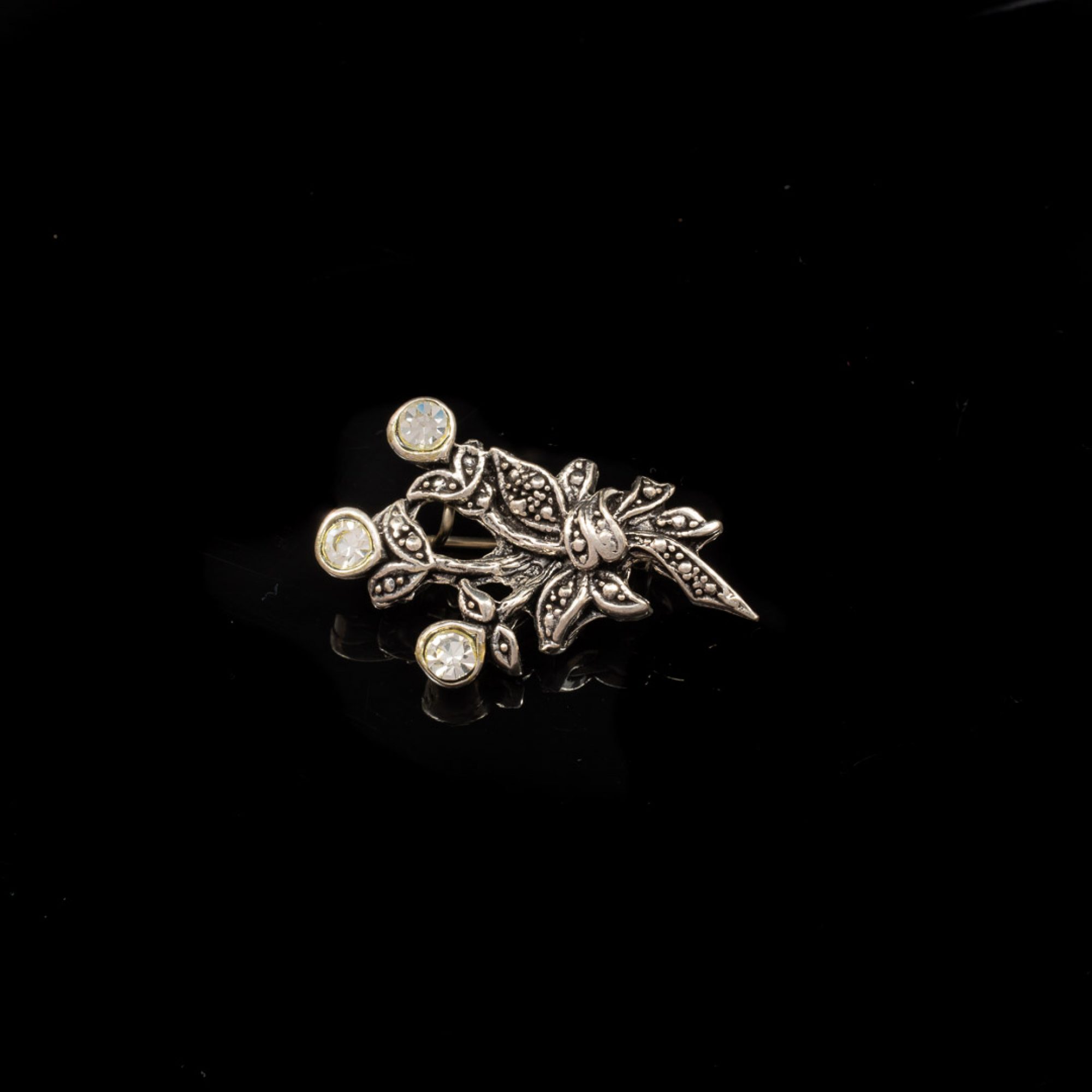 Καρφίτσα με πέτρες ζιργκόν