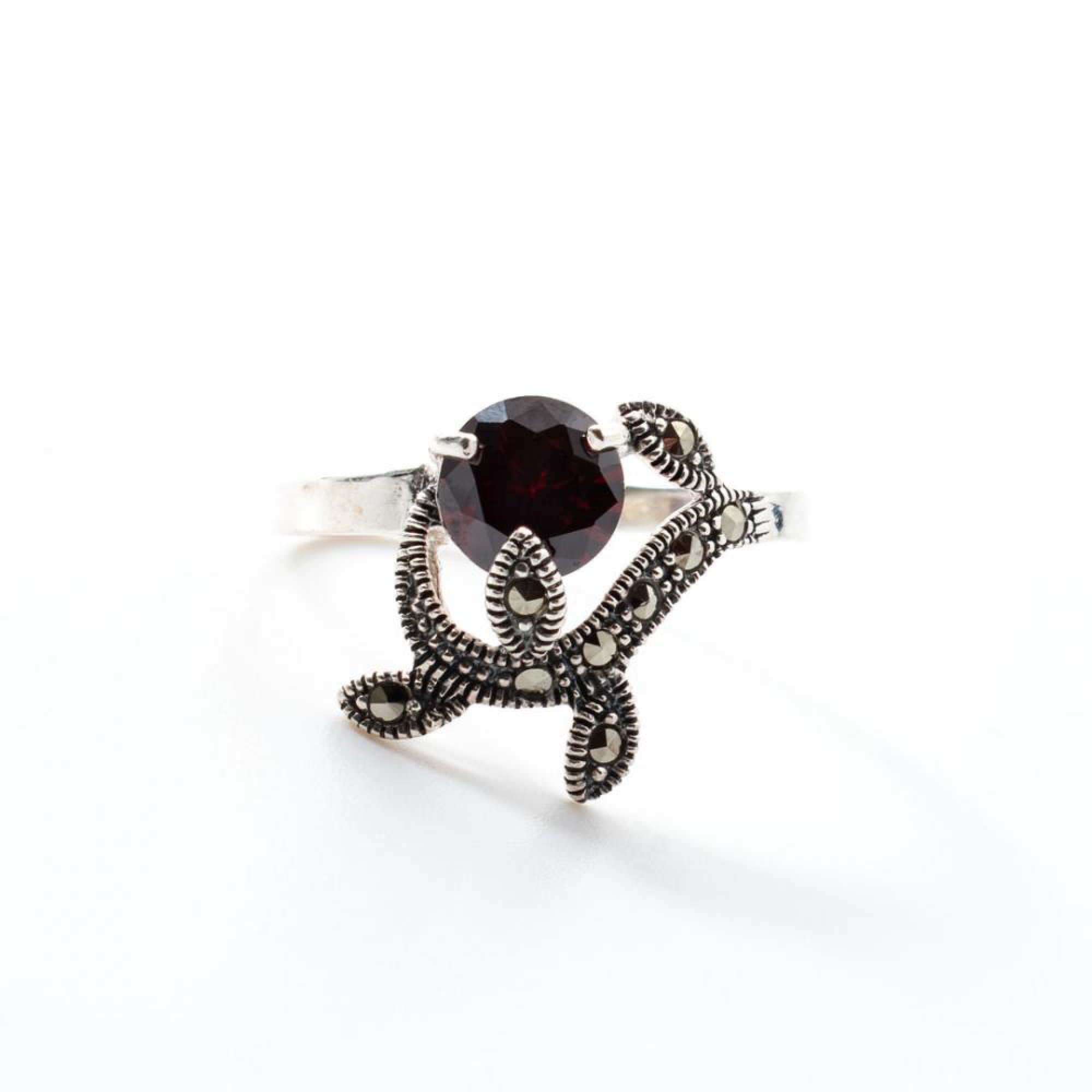 Ring with garnet and marcasites