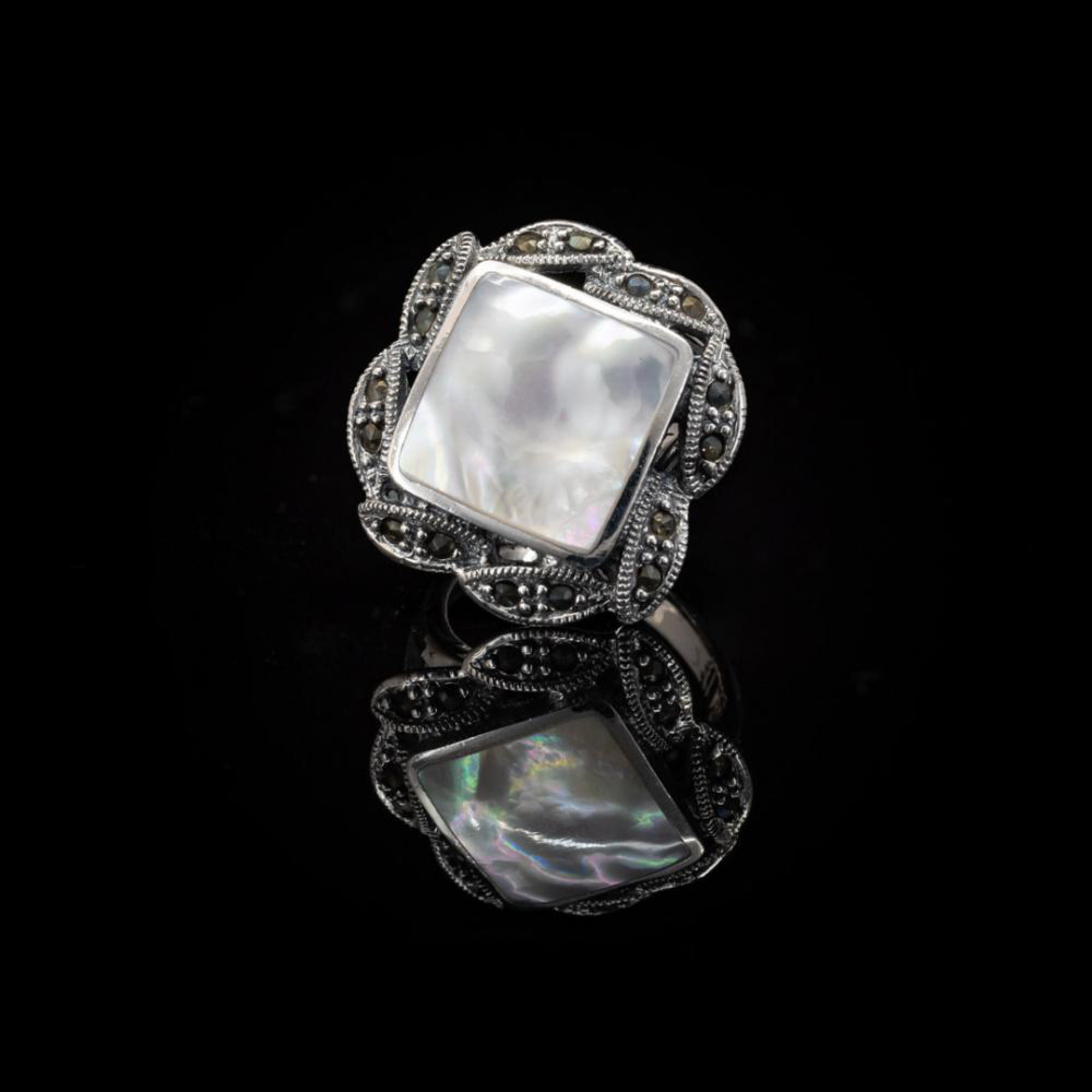 Ring with mother of pearl and marcasites