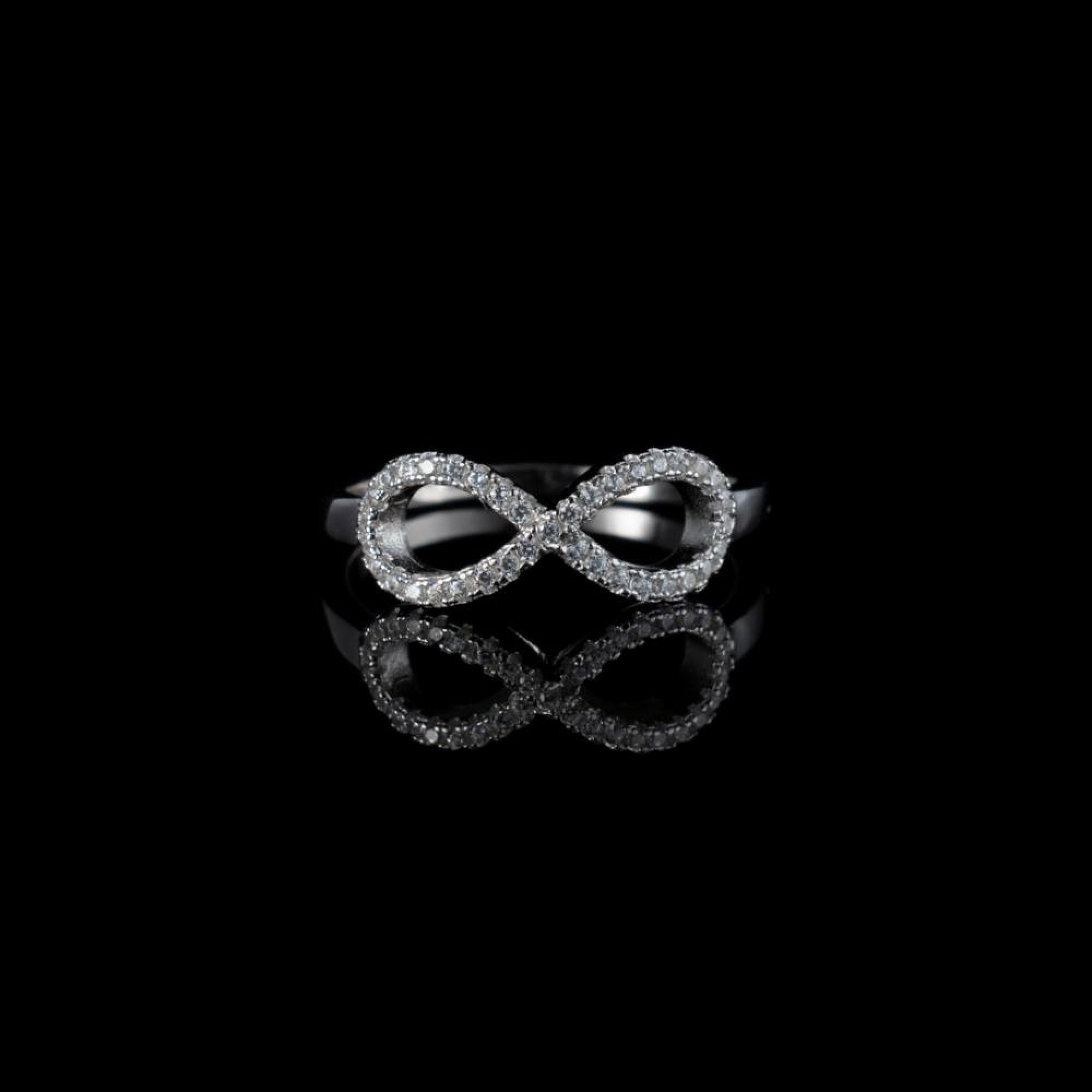 Infinity ring with zircon stones